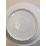 Cup with saucer