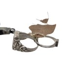 Silver commemorative set referring to the black patriotic jewelry of 1862 (a cross and a pair of rings)