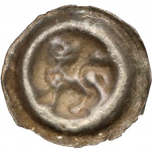 Brakteat guziczkowy (XIII-XIV w.) - Lew z głową do tyłu - rzadki