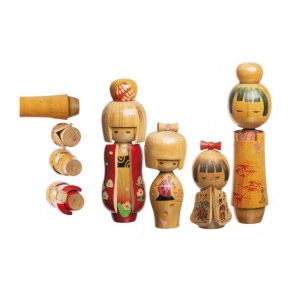 Set of four girls' kokeshi dolls from the Showa era