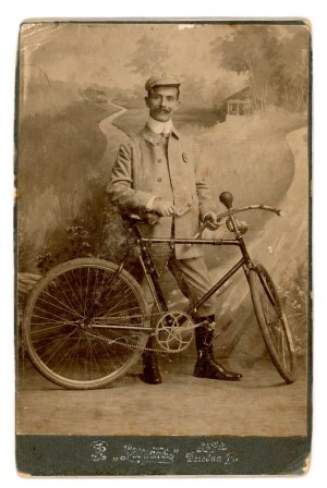 Cabinet photograph, portrait of a man with a bicycle, Lodz (650)