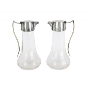 Pair of carafes, glass with white metal mounting