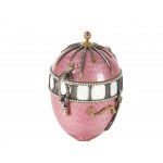 A magnificent clock in the shape of an egg, in the style of Carl Fabergé