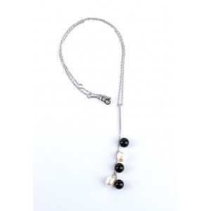 Gold necklace with diamond bar, onyx fringe and freshwater pearls.
