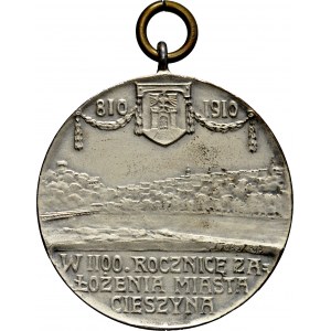 Medalik z 1910 roku medal sygnowany J. RASZKA i L.CHR.LAUER NUERNBERG, wybity dla uczczenia 1100-lecia powstania miasta Cieszyna.