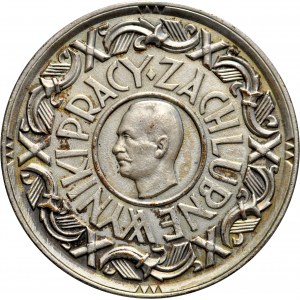 Medal nagrodowy z 1929 roku, autorstwa Mieczysława Kotarbińskiego, nadawany na wystawie gospodarczej w Poznaniu za wyniki w pracy.