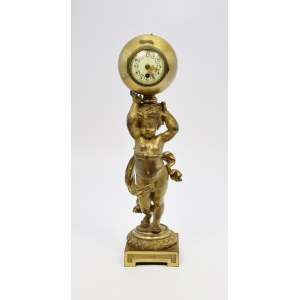 Horloge de cheminée avec putti