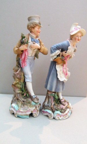 a pair of bisquit figures