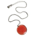 Enameled pendant along with a silver-colored chain