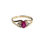 Gold ring with pink eye and zircons (585)