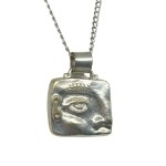 Artistic face necklace