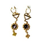 Gold-plated vintage earrings with colored eyes