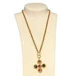 Pendant in the form of a cross with colored stones