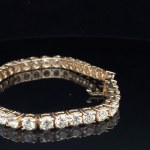 BRACCIALE TENNIS IN ORO 18K CON DIAMANTI PER 18 CT