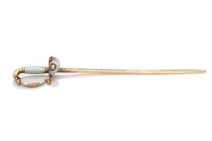 A pin in the form of a saber, early 20th century.