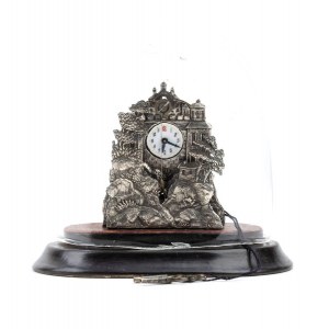 Silver table clock with glass dome