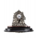 Silver table clock with glass dome