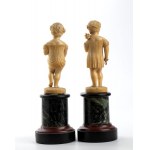 A pair of ivory carvings depicting the Summer and the Autumn