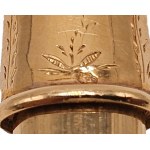 A French gold manicure with ivory case