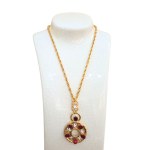 Vintage-style gold-plated medallion with Swarovski crystals