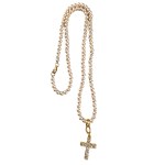 A pearl necklace with a cross encrusted with Swarovski crystals