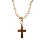 A pearl necklace with a cross encrusted with Swarovski crystals