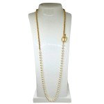 A pearl necklace with a decorative clasp
