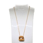 Gold-plated necklace with a decorative pendant and a retro-style crystal