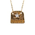 Gold-plated necklace with a decorative pendant and a retro-style crystal