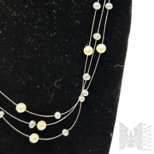 Necklace with Plastic Pearls on Strands.