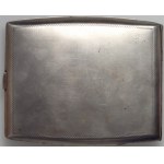 Silver cigarette case with KS monogram and small ruby
