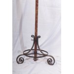 Candlestick on polychrome wooden rod