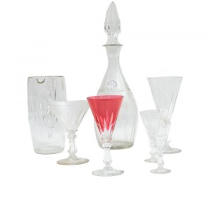 Set of white and red crystal glasses in six different sizes