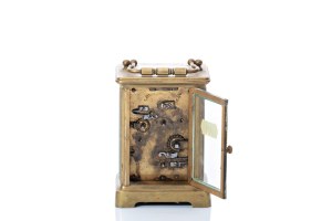 BRASS TRAVEL CLOCK WITH FLYWHEEL MOVEMENT AND ALARM | WESTERN EUROPE (WESTERN EUROPE / WESTERN EUROPEAN 19.-20. CENTURY)