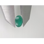 Natural emerald with a valuation of 1046 US dollars.