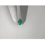 Natural emerald with a valuation of 1046 US dollars.