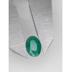 Natural emerald with a valuation of 1046 US dollars.
