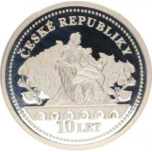 Ražby fy. Zlatá Koruna, 10 let České republiky, sedící Evropa, na pozadí mapa ČR, opis