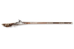 Shotgun with a combined roller and cigar lock
