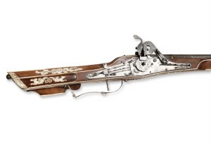 Shotgun with a combined roller and cigar lock
