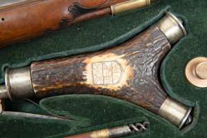 Flintlock pistols (pair in cartridge) 
