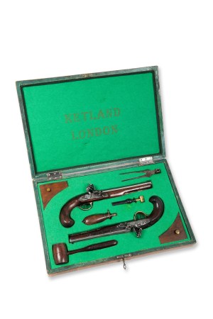 Pair of flintlock pistols in a case 