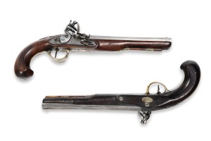 Pair of flintlock pistols in a case 