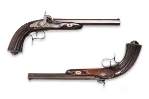 Pair of percussion pistols in a case 