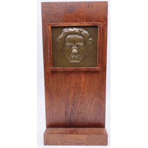 Placchetta in bronzo montata su base e spalla in legno …