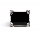 Bague en or ornée d'un diamant et d'un onyx