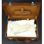 Leather suitcase with a set of underwear and travel toiletries, early 20th century (342)