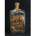 Looms in a bottle. An intricately made old model of a weaving workshop(938)
