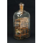 Looms in a bottle. An intricately made old model of a weaving workshop(938)
