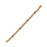 Armoured bracelet with emerald cabochons